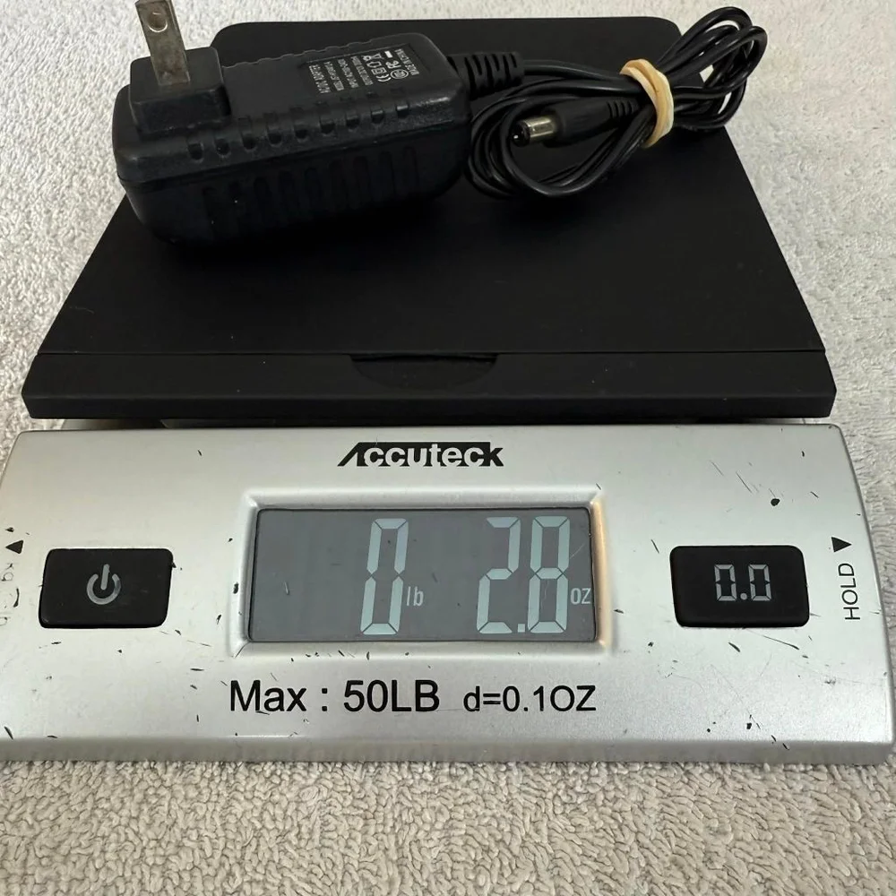 Black AC/DC Adapter One Size